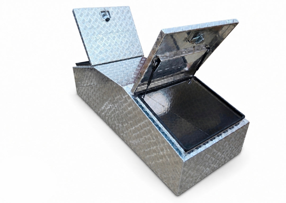 A rectangular diamond plate metal storage box with its lid open, showing a black interior tray, photographed on a plain white background.