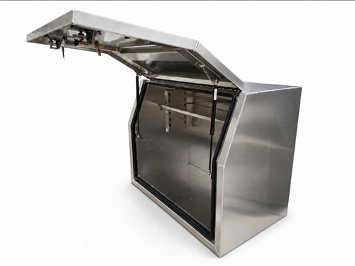 An aluminium toolbox for ute storage cabinet with its hinged lid open, showing an interior shelving, photographed on a white background.