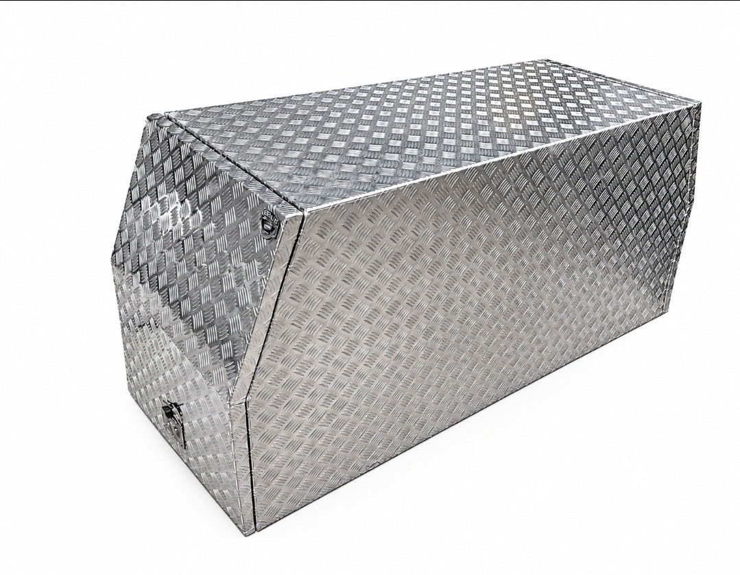 A diamond plate aluminum toolbox with a pointed triangular front and a secure latch, shown on a plain white background.